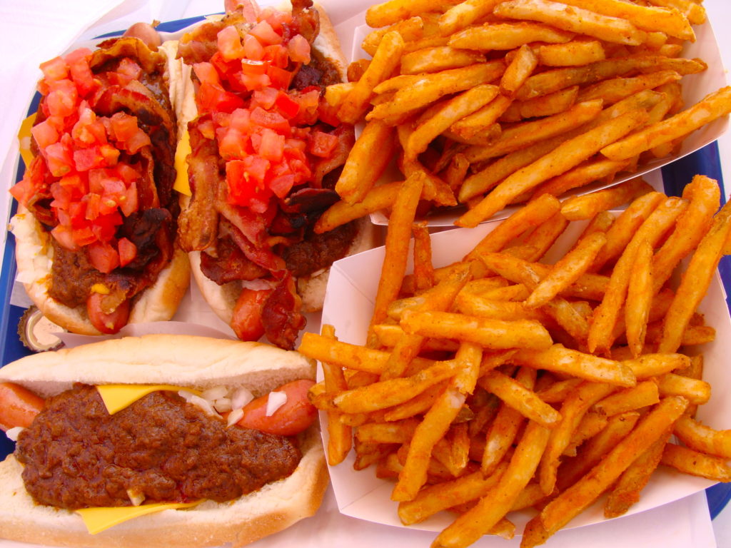 three chili dogs and 2 orders of fries from Pinks Hot Dogs in Los Angeles, California