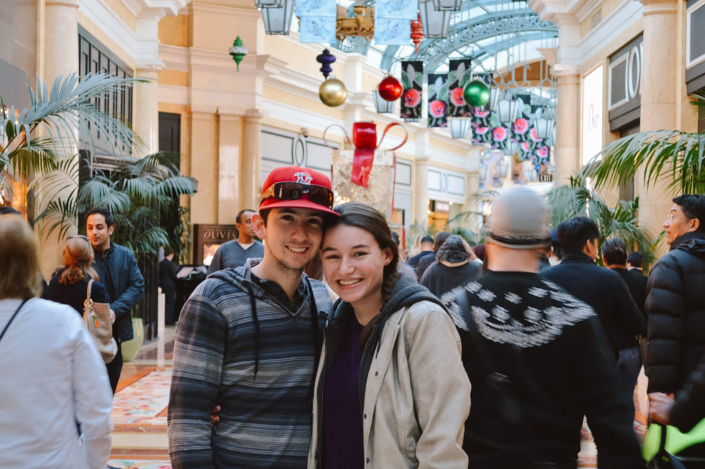 young couple inside a Las Vegas hotel shopping center