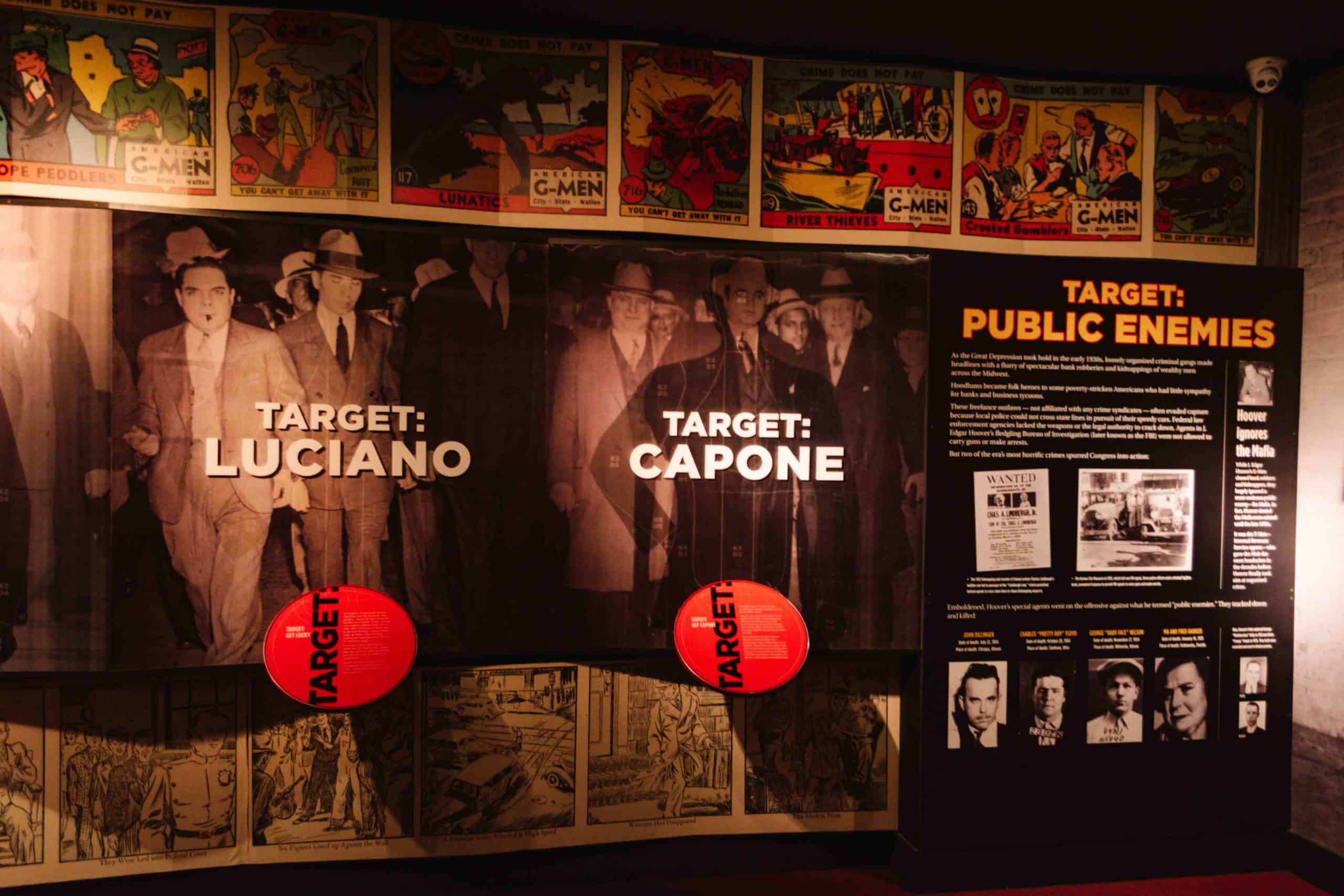 Interior of the Mob Museum in Las Vegas with Public Enemy targets on museum display including Luciano and Capone.