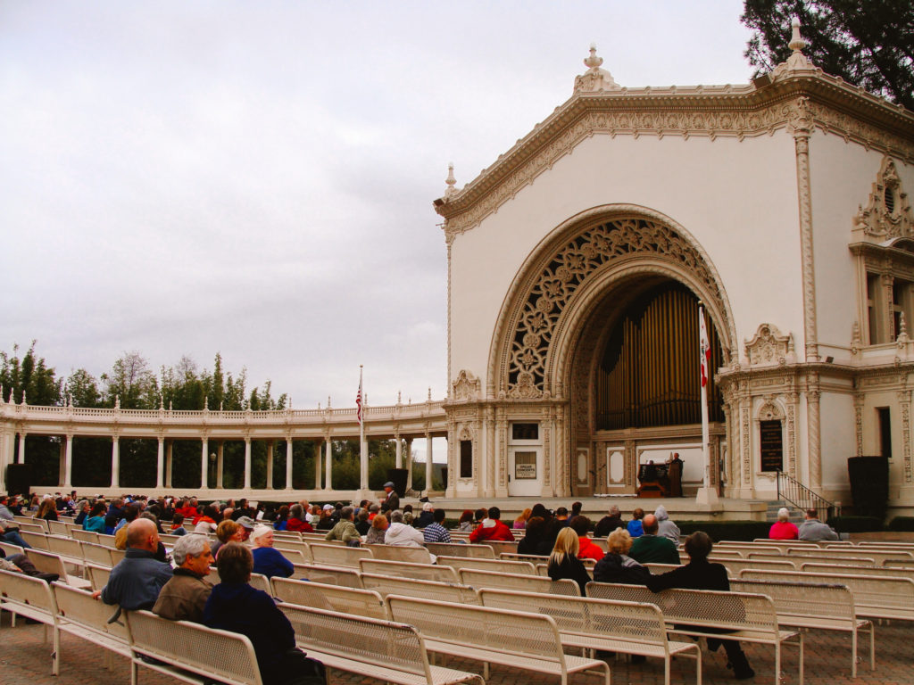 outdoor concert venue in San Diego public park with organ and many benches
