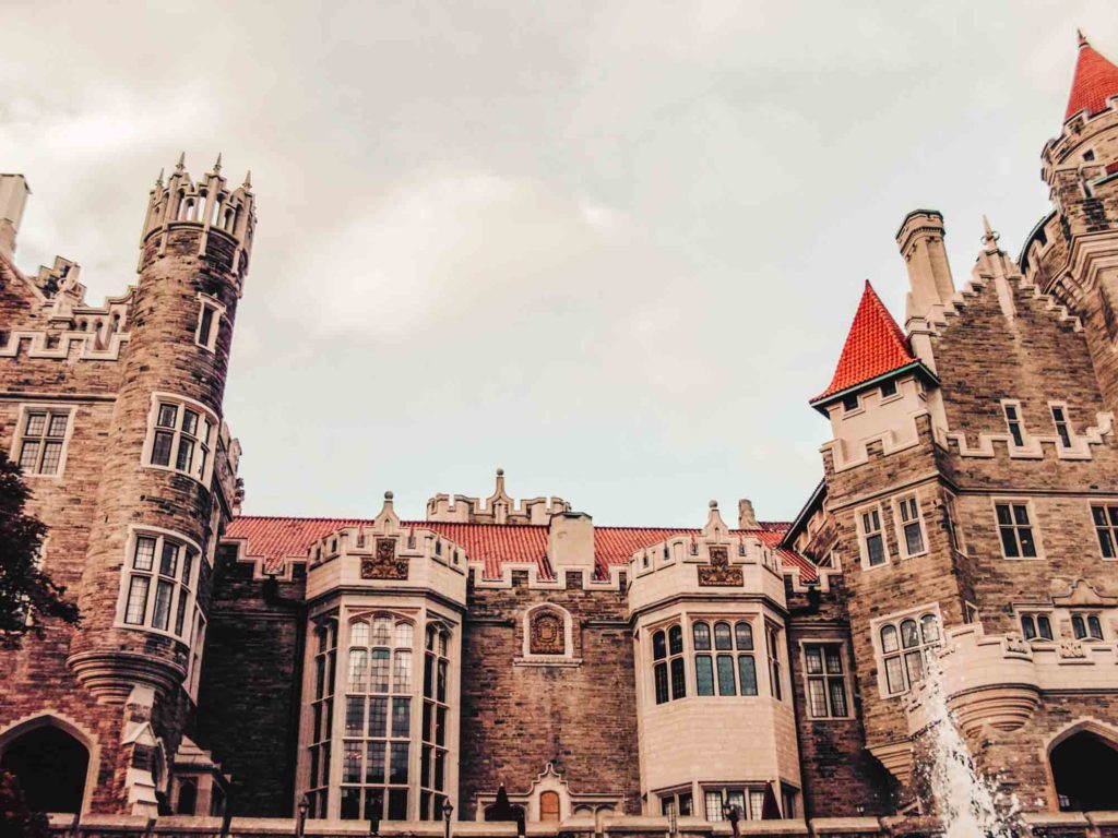 Casa Loma in Toronto Canada view from the ground looking up with a cloudy sky