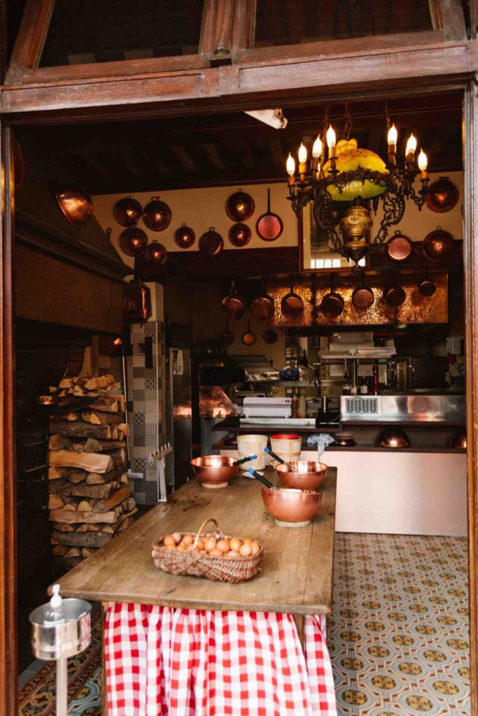 Interior of French restaurant that makes puff omelettes which you can watch them make from here