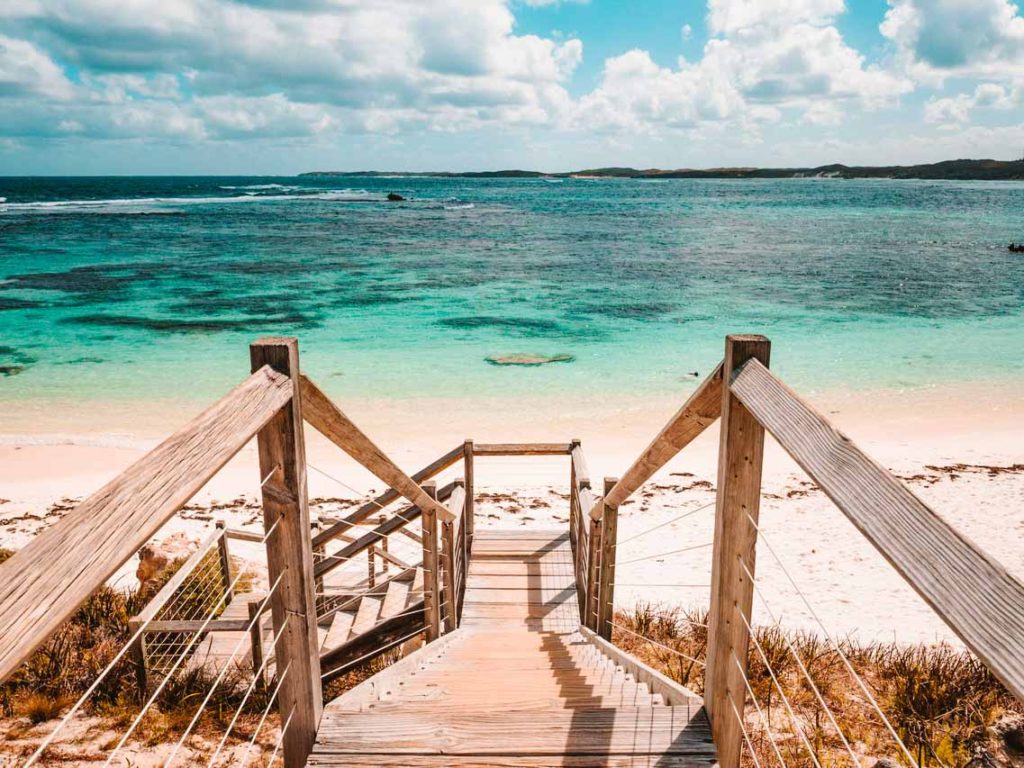 Perth beach with stairs descending to the sand and beautiful turquoise water beach in the background
