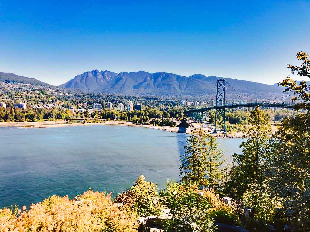 Prospect Point in Vancouver overlooking the river and bridge with mountains in the background