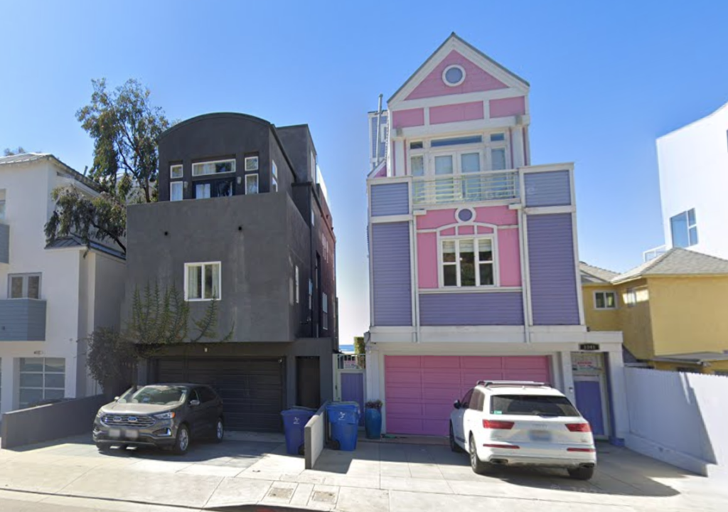 street view of two 3 story homes in Santa Monica, one is all black, the other is bright pink and purple