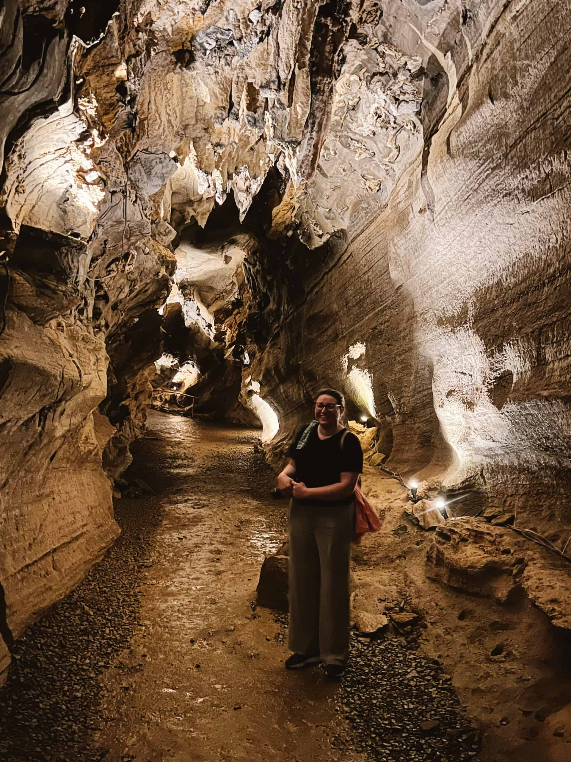 Woman standing inside Appalachian Caverns in tennessee