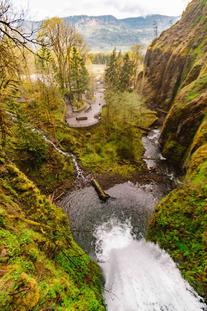 Multnomah Falls hike that leads you to the bridge where the view looking out at the Columbia River Gorge is shown here