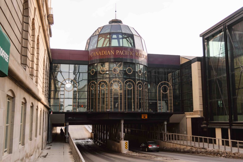 Canadian Railway tracks station going over the road