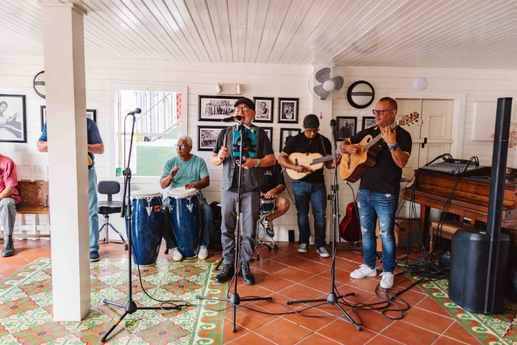 local Puerto Rican band playing music in a historic music museum