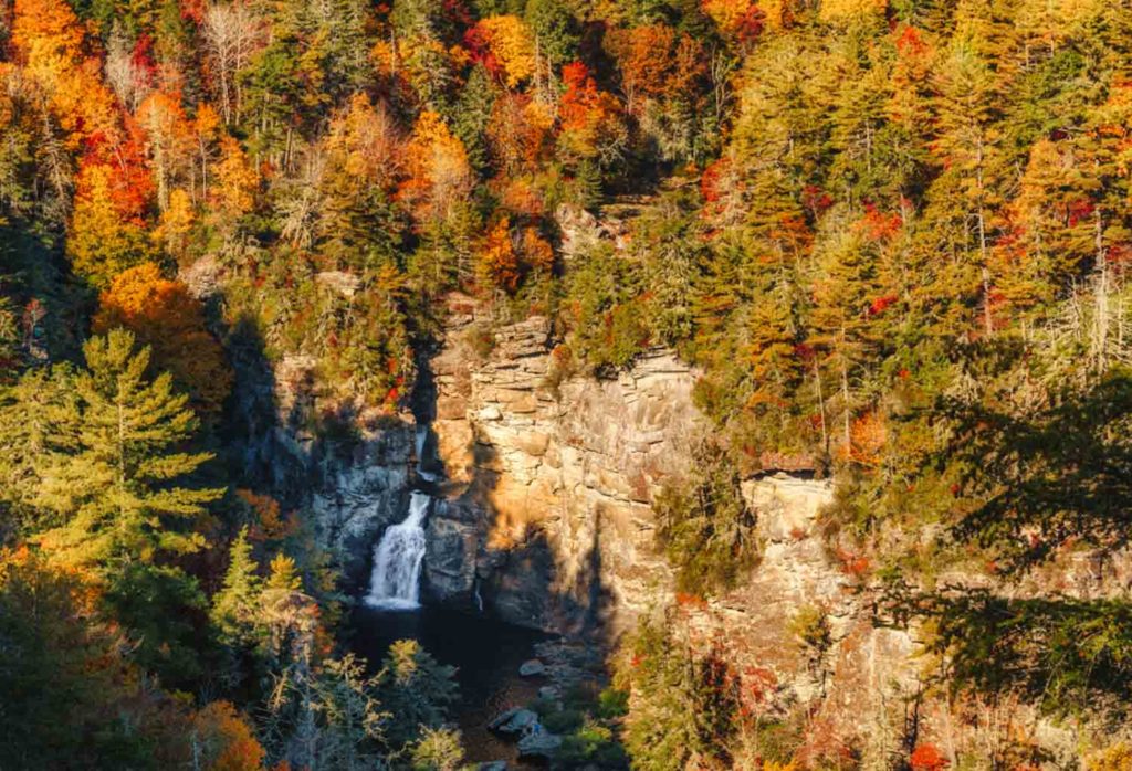 Blue Ridge Parkway overlook of waterfall and fall foliage