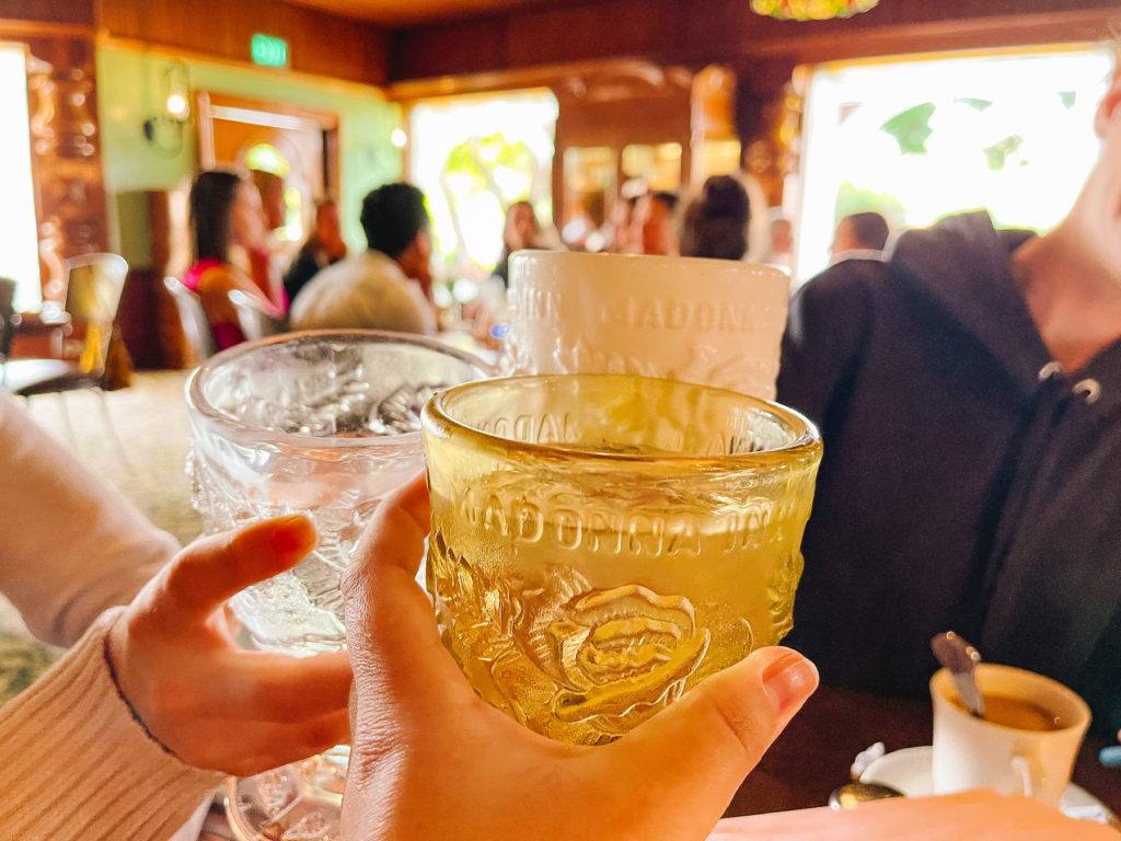 clinking goblets at the madonna Inn copper cafe