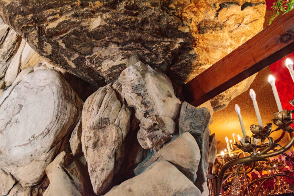 Fossil embedded in a rock in a fireplace decor