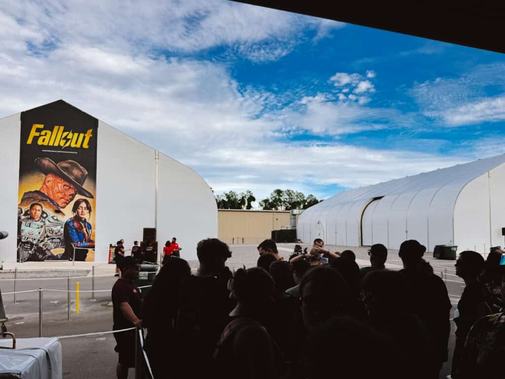 Queue waiting to get into the Fallout house at Halloween Horror Nights in the late afternoon