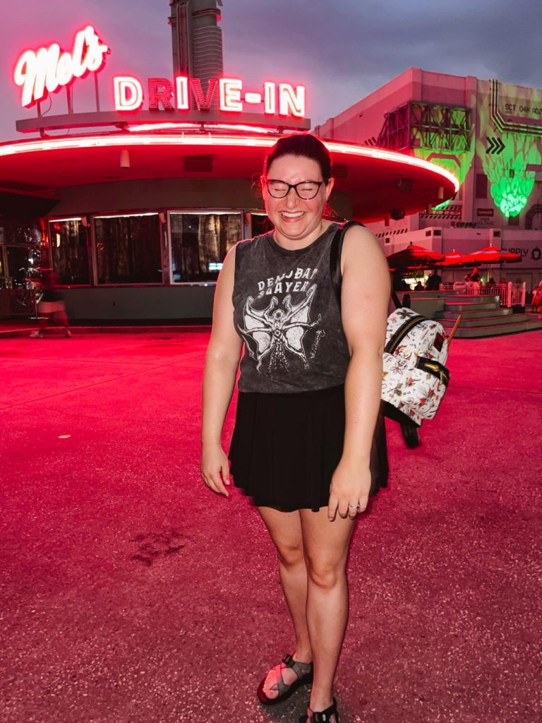 Woman standing in front of mel's Die In at Universal Studios of Florida.