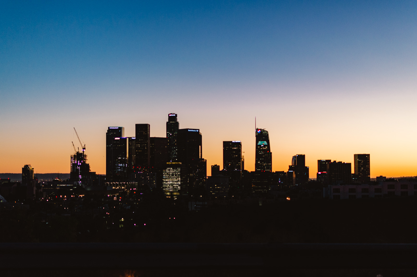 Downtown Los Angeles skyline during sunset view from Dodgers Stadium, near Silver Lake which is a great place to stay when exploring downtown Los Angeles