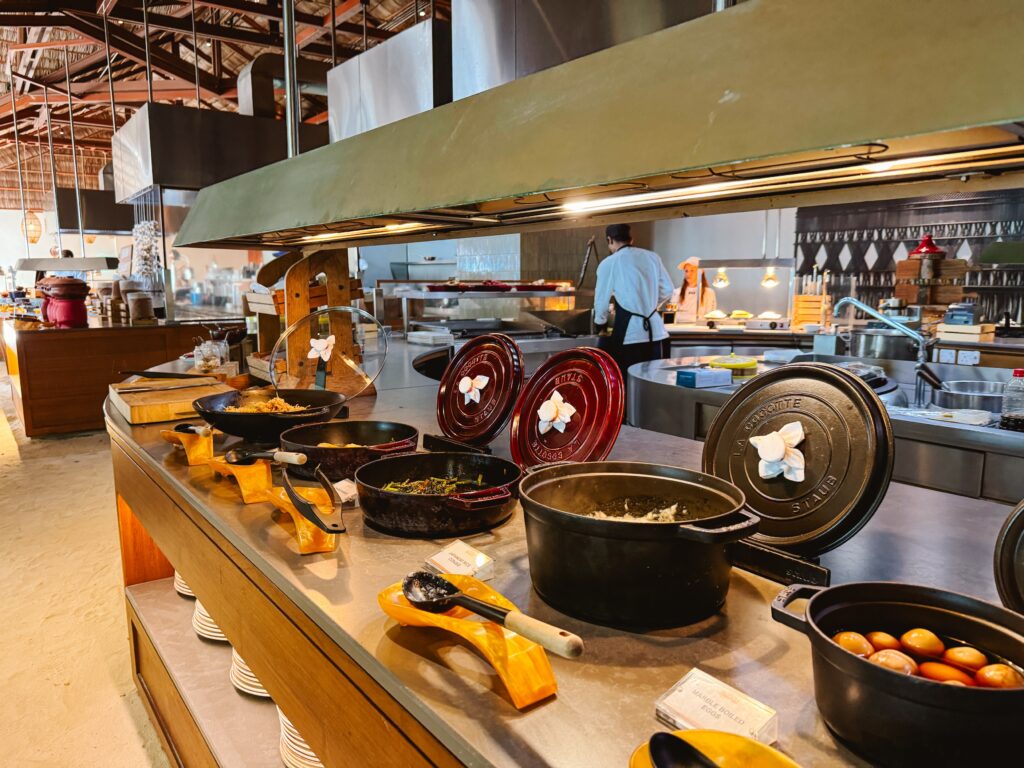 Breakfast buffet shown, specifically the Chinese cuisine, at Atoll Market, free as Hilton Honors status members