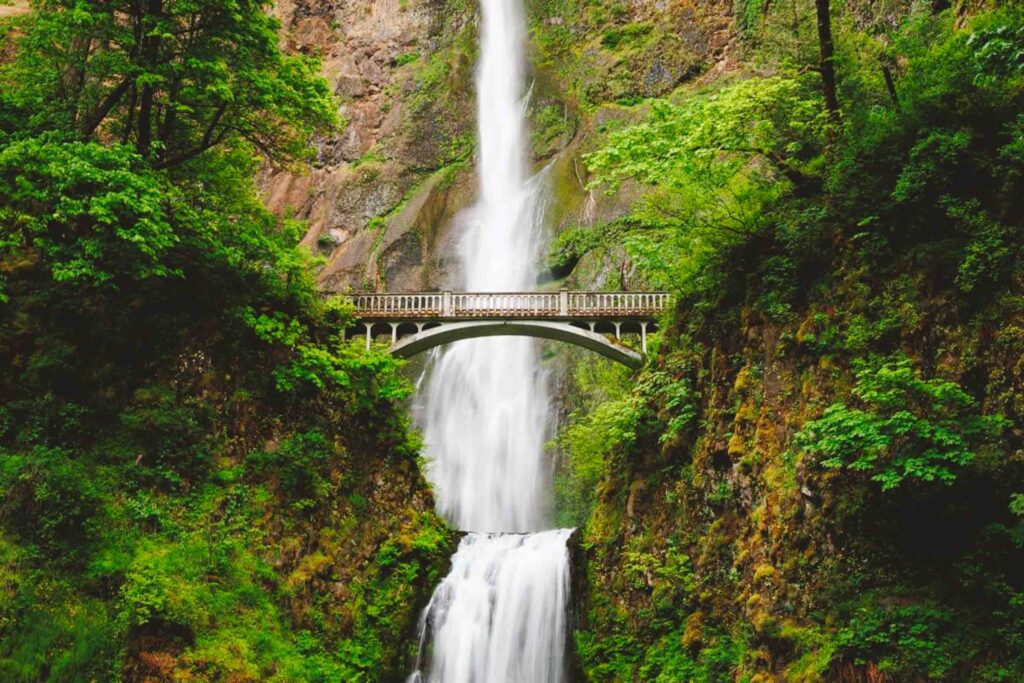 Multnomah Falls with double cascade of water with bridge intersecting