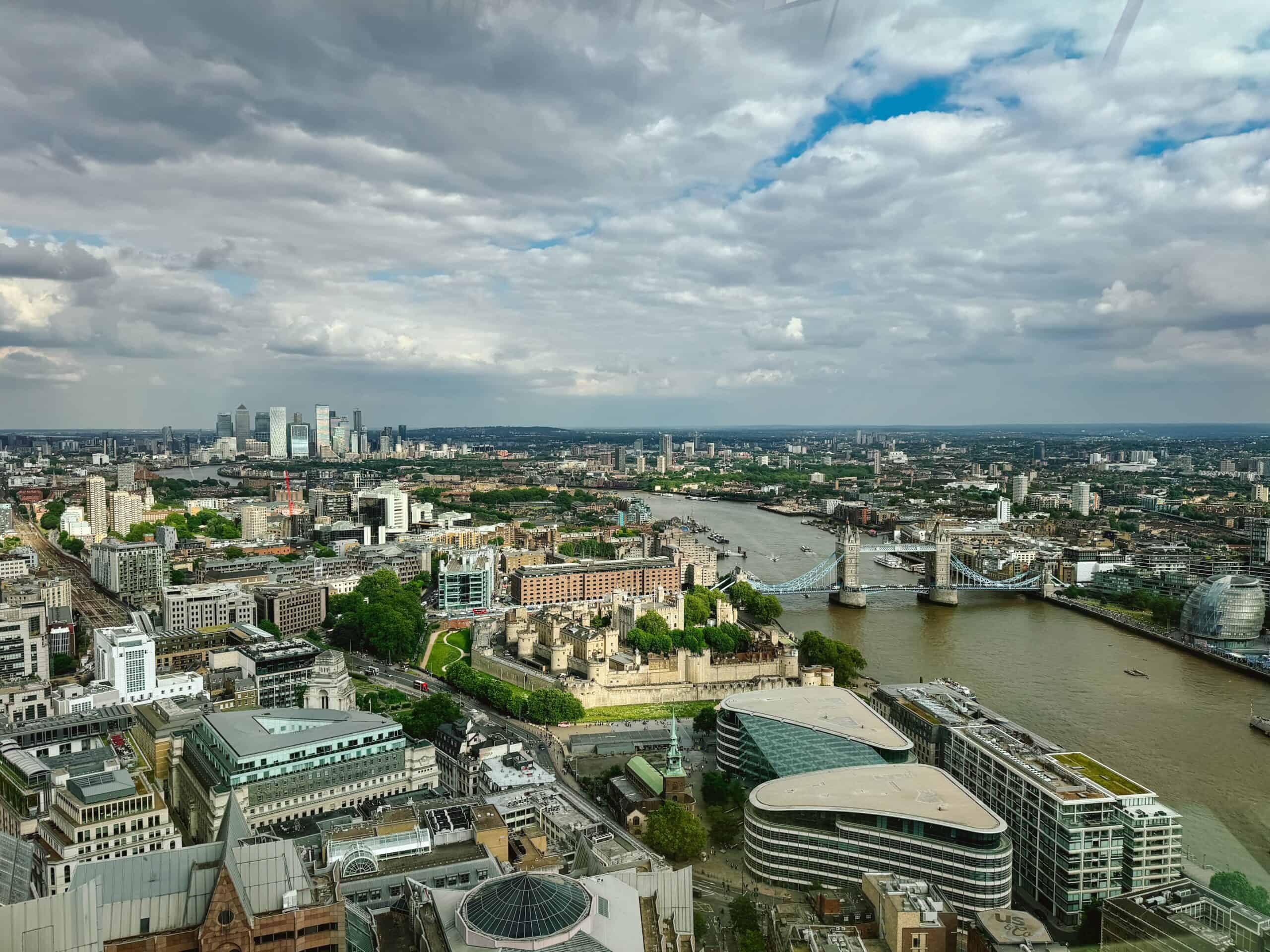 Sky Garden view of London from the observation deck garden with Tower Bridge and Tower of London below