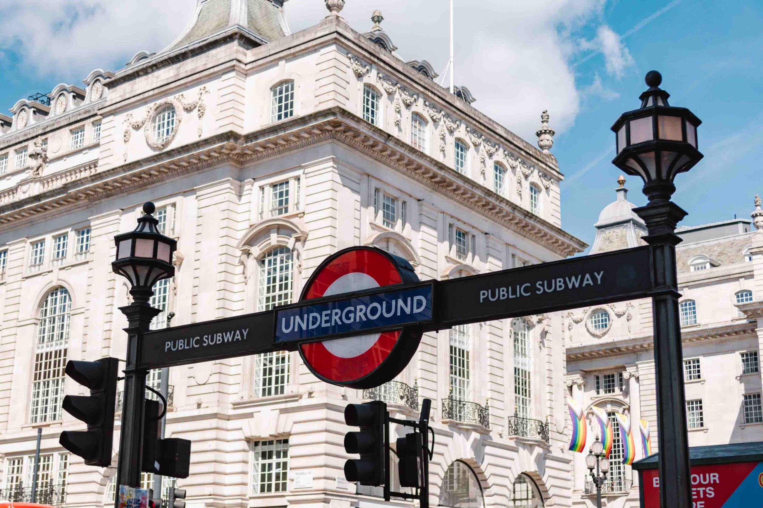 Arched sign for London's Underground at a station's entrance above ground