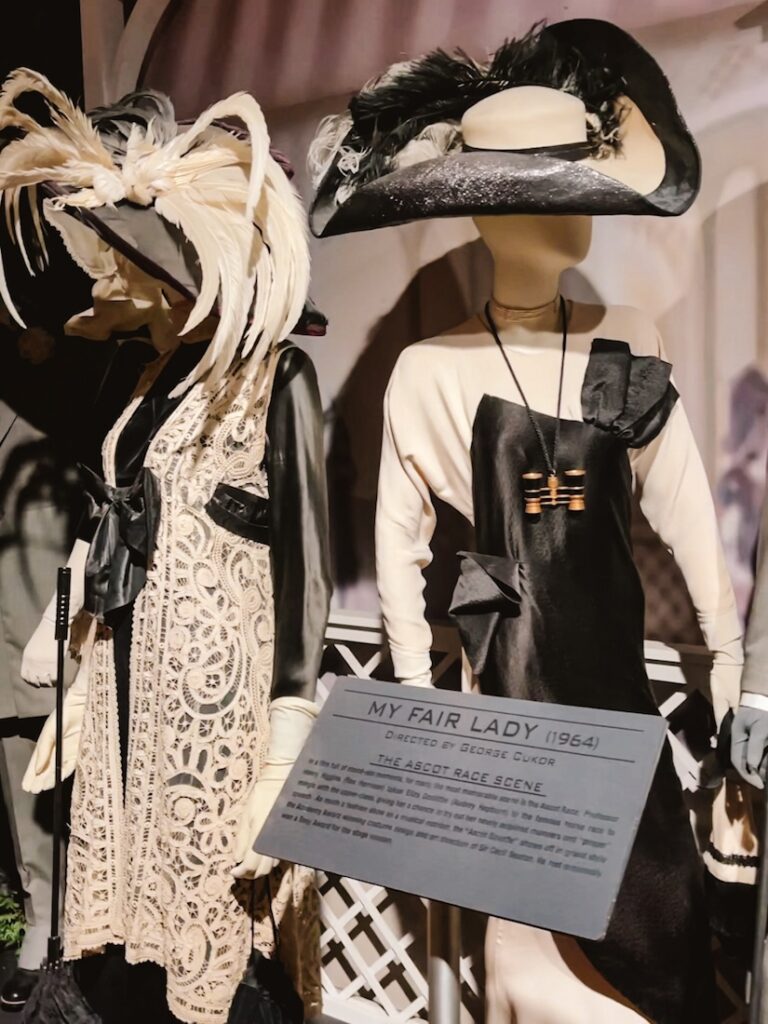 Black and white costumes from My Fair Lady on display in an exhibit at Warner Brothers Studio