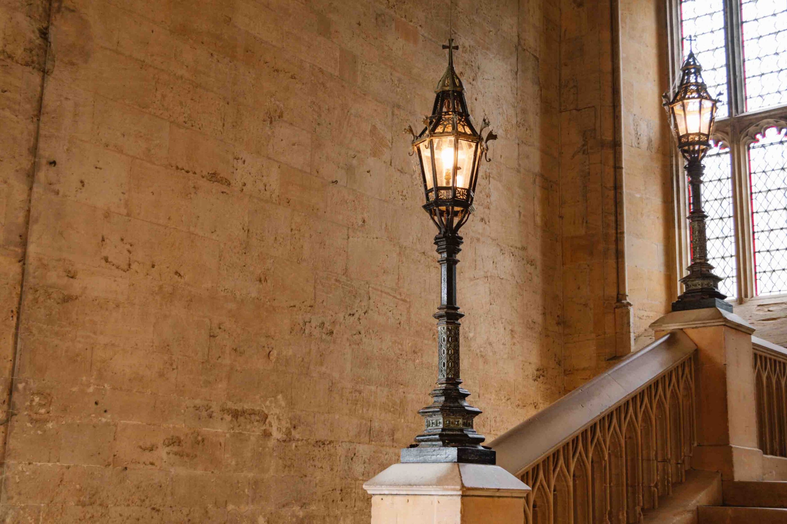 Detailed shot of two lamp posts on stair banister in Oxford University