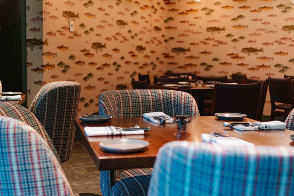 Heirloom Room restaurant in Gatlinburg interior with plaid chairs and dining room