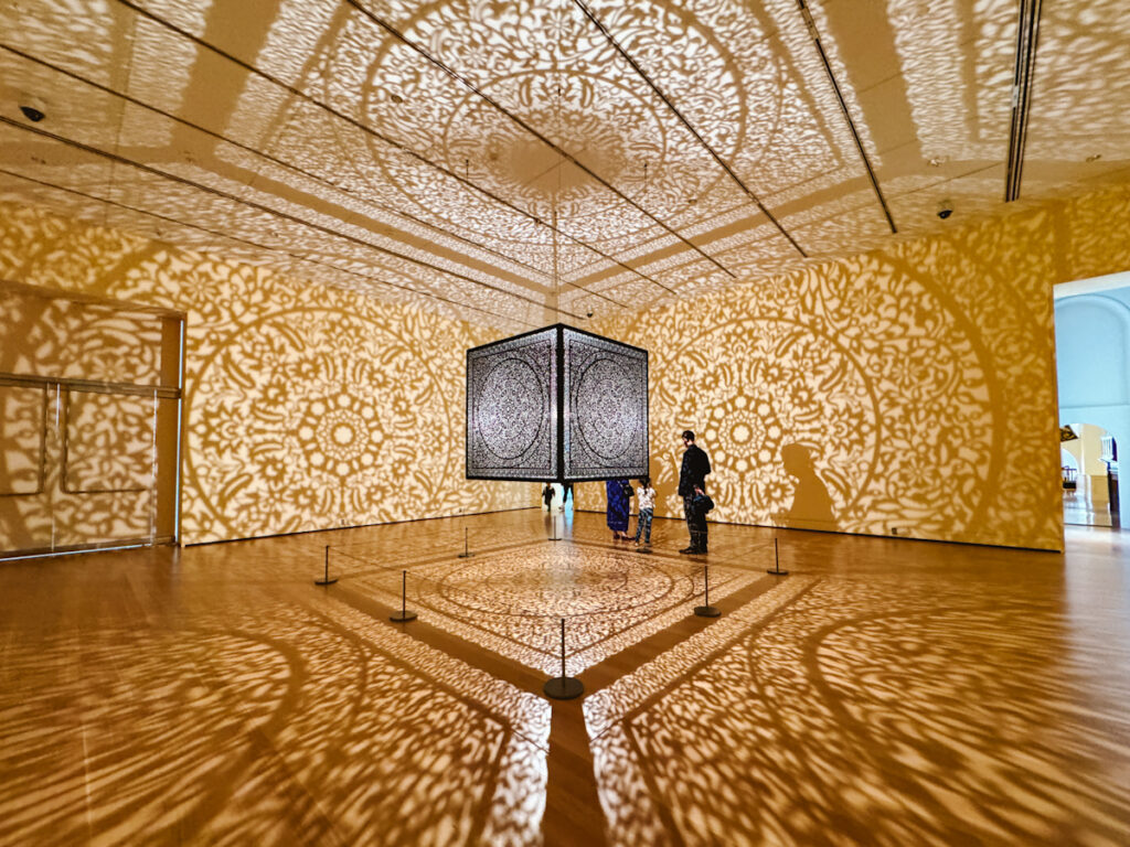 Light art installation where the center light box projects beautiful shadows on the surrounding walls