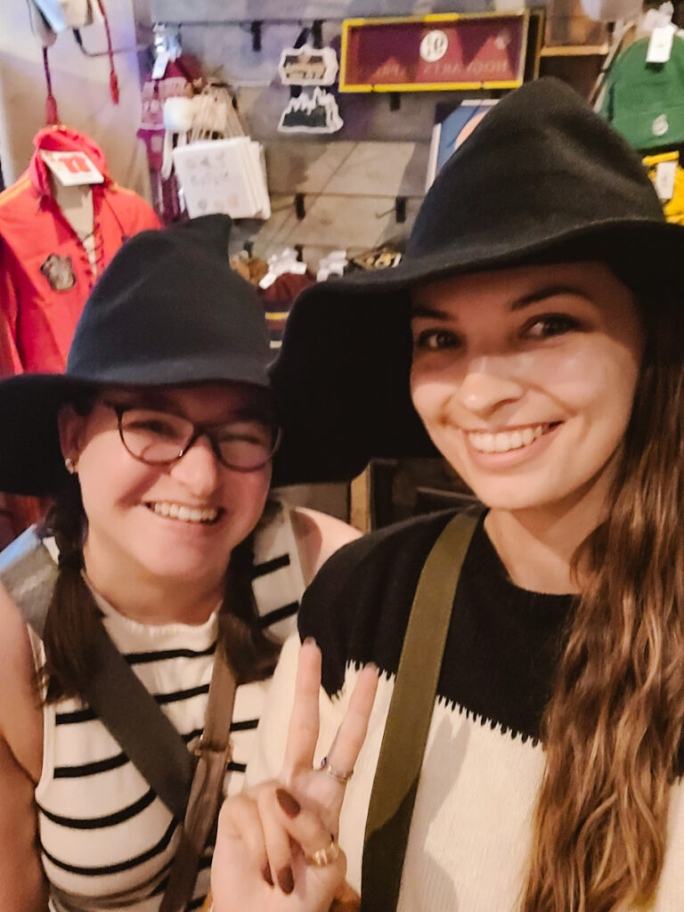 Trying on witch hats in Salem