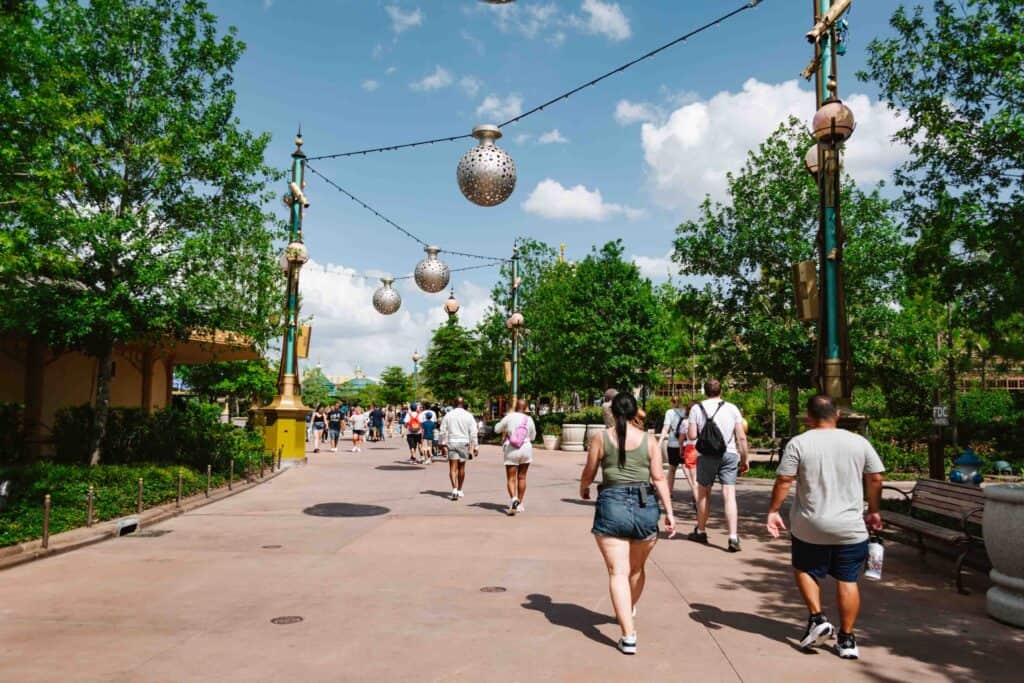 Walking between portals at Epic Universe through Celestial Park where there isn't a ton of shade