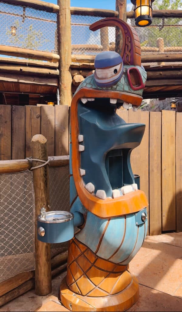 How to Train Your Dragon themed water bottle fill station in a ride's line