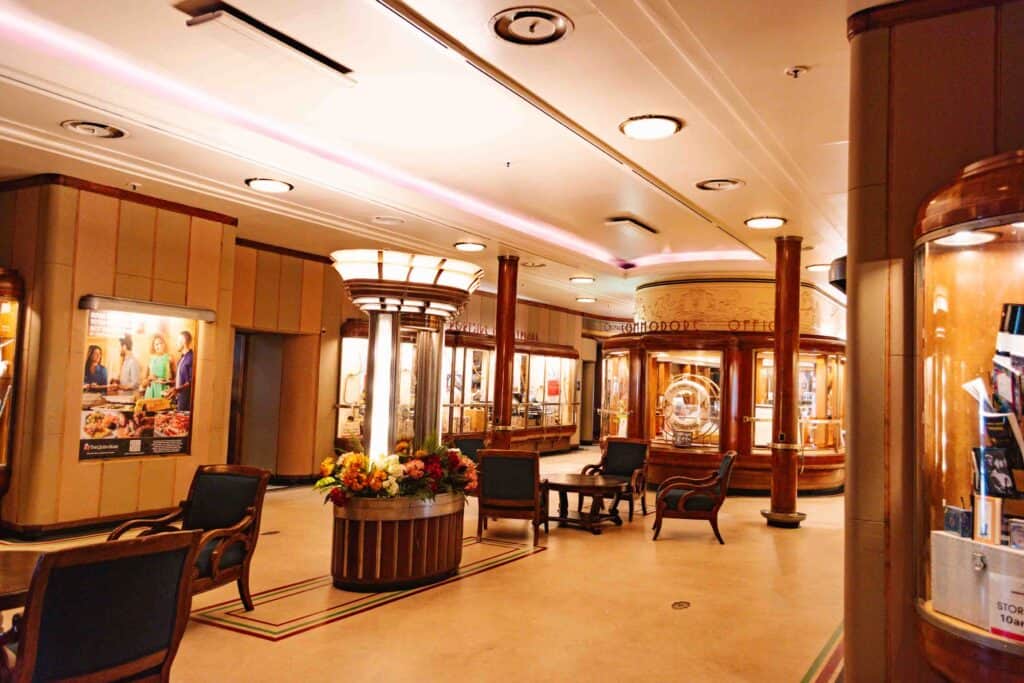 Historic shops inside The Queen Mary with a sweets shop, bookstore, and gift shop