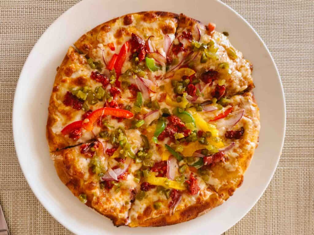 Flat lay view of Mexicana pizza from adults-only resort in Mexico.