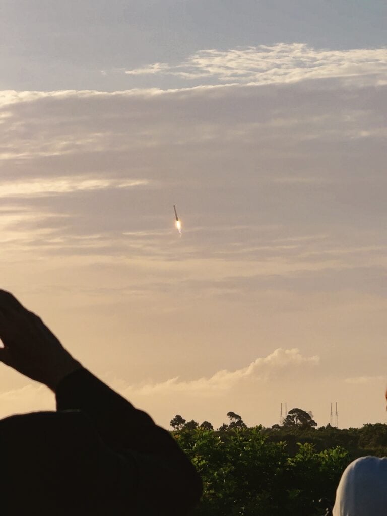 Falcon 9 boosters re-entering the atmosphere and landing in Cape Canaveral Florida