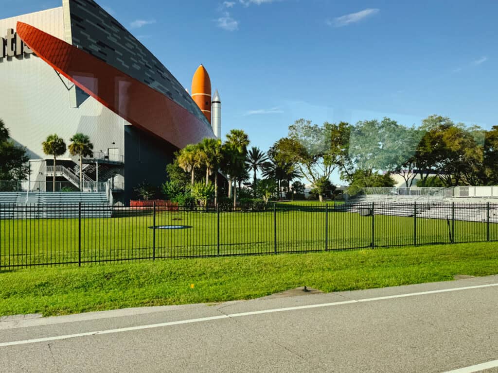 Kennedy Space Center rocket launch viewing area behind Atlantis with bleachers